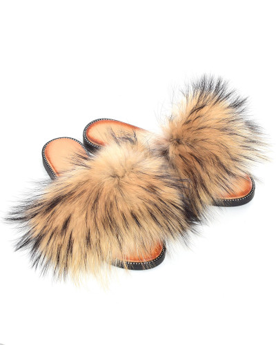 Women's leather slippers with raccoon fur
