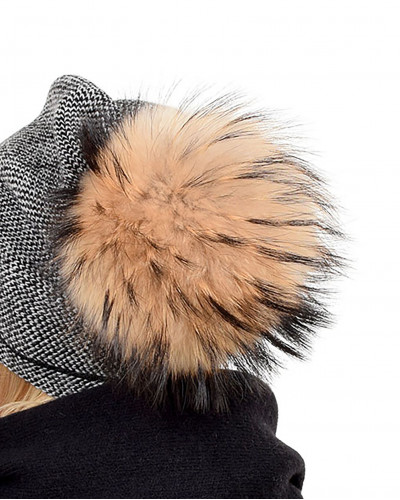 Pompom for the hat of natural finn raccoon fur